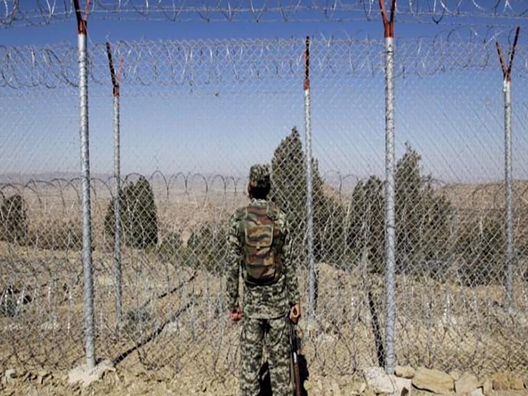 Terrorists from inside Afghanistan fire on a Pakistan military post