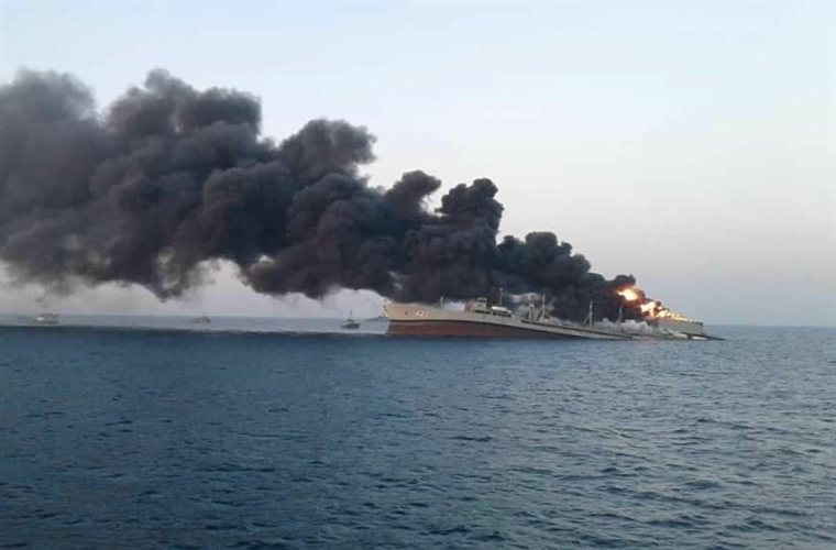 Largest ship in Iranian navy sinks after catching fire